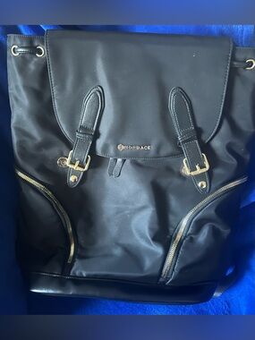 Nordace Eliz Black Nylon Flap Backpack with Gold Hardware